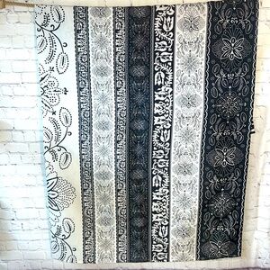 Shower curtain in next to new condition. Black and white.